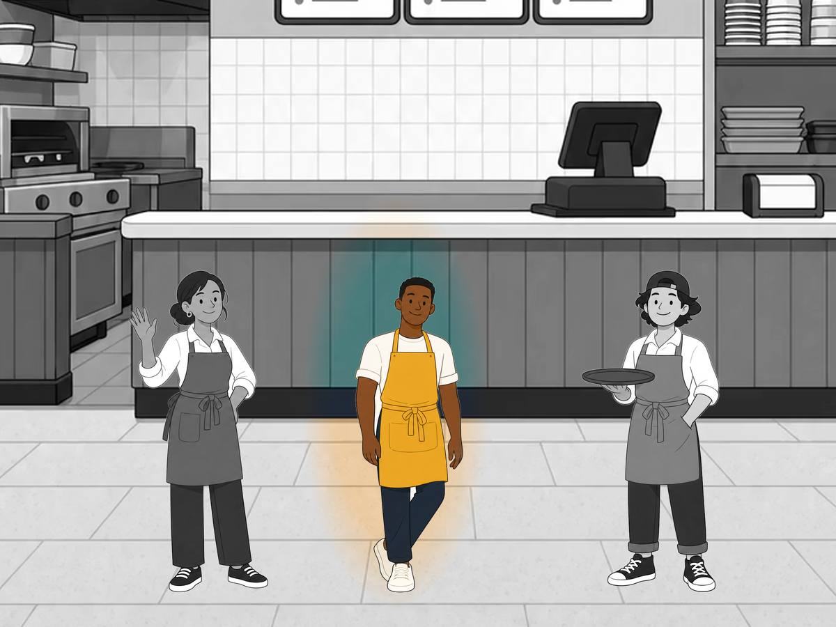 A store with only one worker in colour